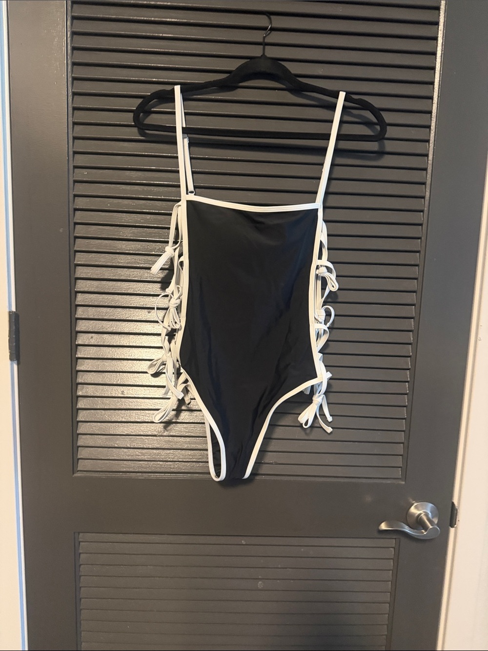 Fashion Nova Black One-Piece Swimsuit with White Trim and Side Ties